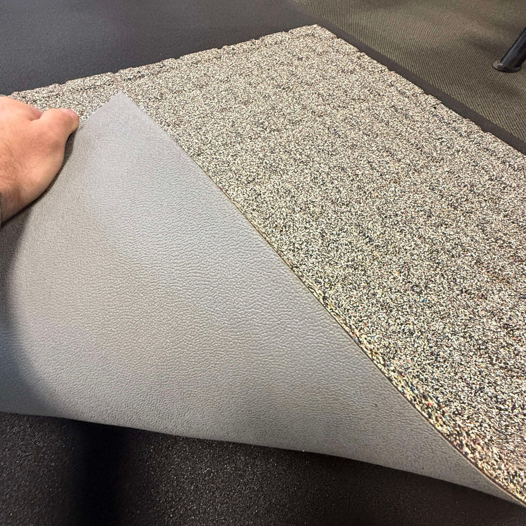 ![BYFIT rubber flooring tile with a rolled-up portion showcasing its two-sided design: one side is speckled and the other is a solid grey.](#placeholder_link)
